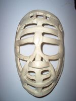 Dave Kelly's prototype goalie mask, made by Corkey Stickell, front shot